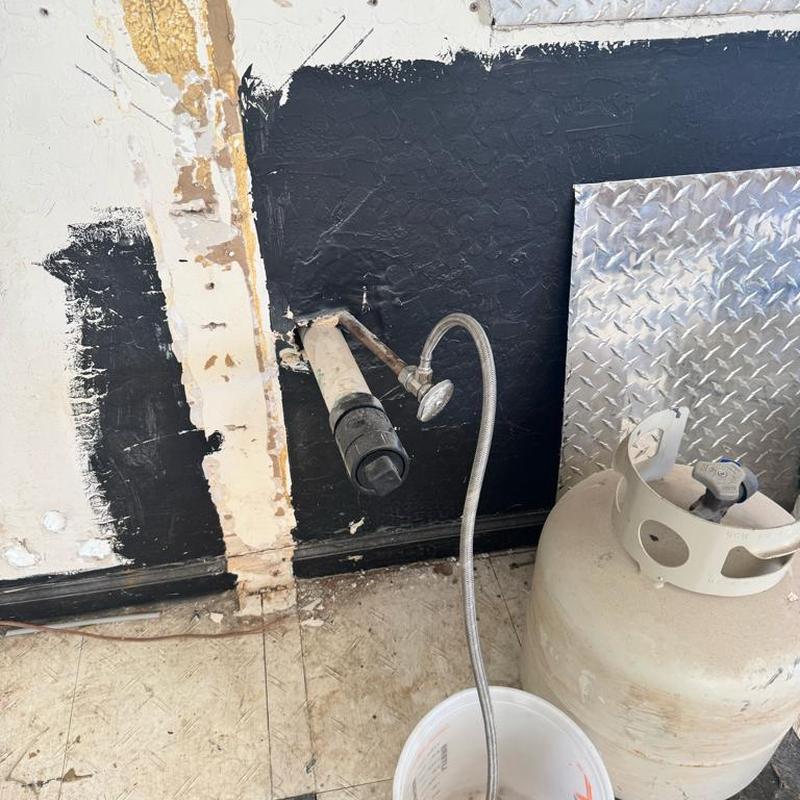 PVC drain and copper irrigation line removal hole in wall PVC drain and copper irrigation line removal hole in wall