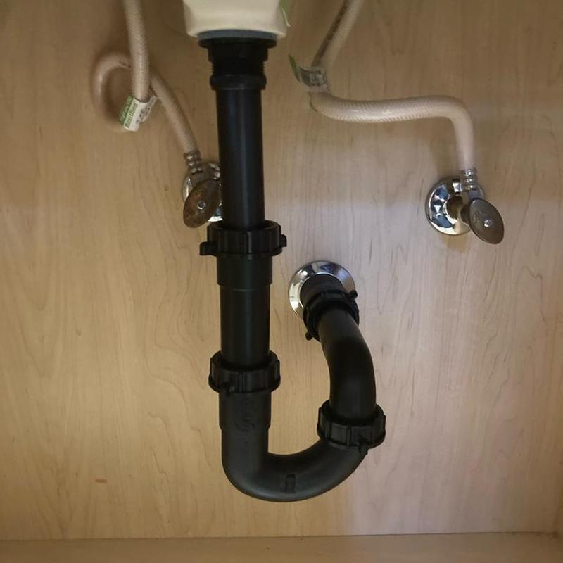 Bathroom sink O.R.B. push to stop drain assembly under sink