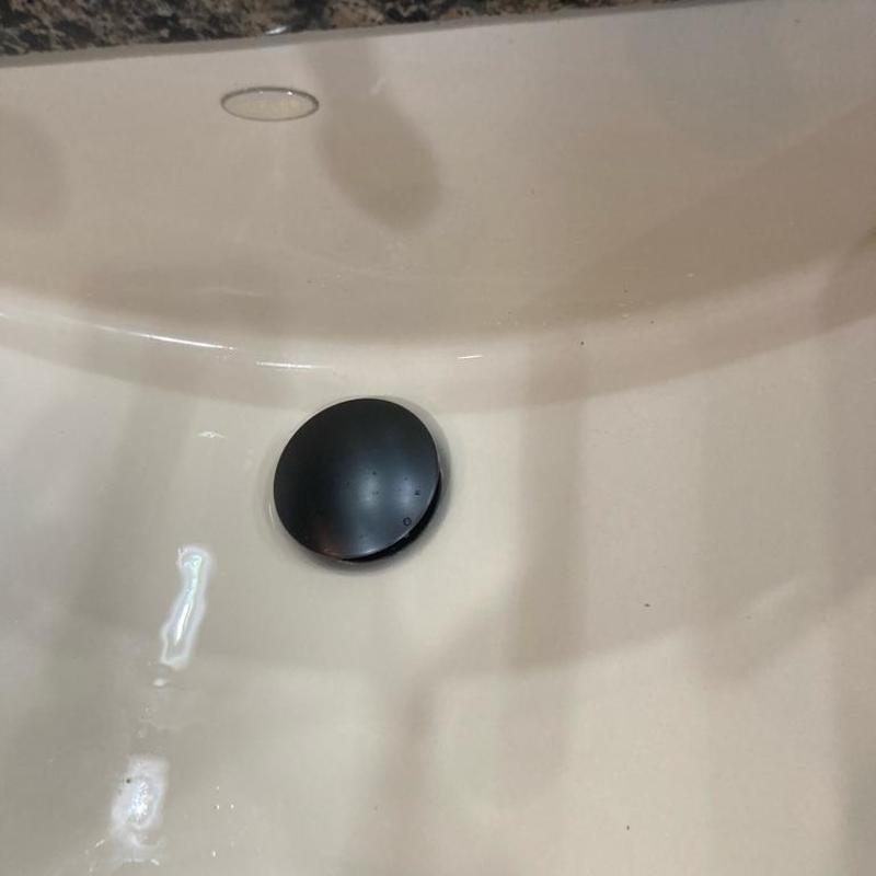 Bathroom sink O.R.B. push to stop drain installed