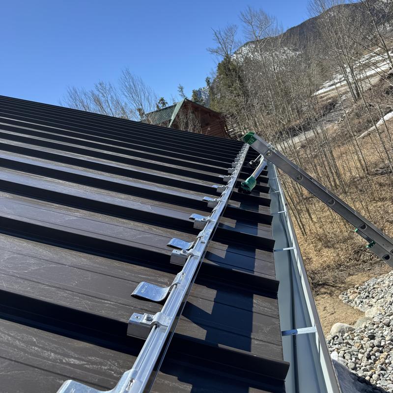 S-5 Sno Stop snow guard on metal roof installation S-5 Sno Stop snow guard on metal roof installation