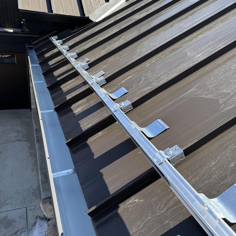 S-5 Sno Stop snow guard on metal roof panels S-5 Sno Stop snow guard on metal roof panels