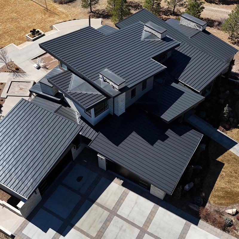 Standing seam metal roof with snow fence installed Standing seam metal roof with snow fence installed