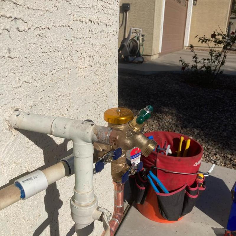 Pressure vacuum breaker and hose bib installation outdoors