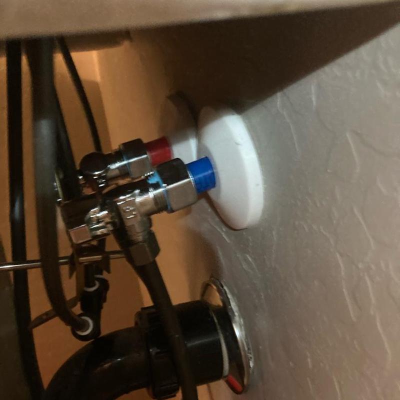 Hot and cold angle stop valves with shutoff in bathroom