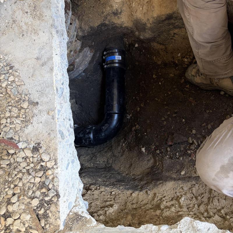 Sewer main pipe burst with HDPE fitting in trench Sewer main pipe burst with HDPE fitting in trench
