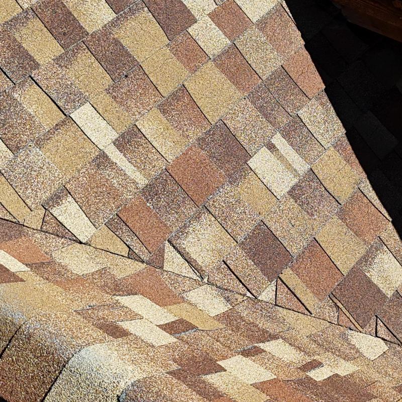 Asphalt shingle roof close-up with detailed pattern Asphalt shingle roof close-up with detailed pattern