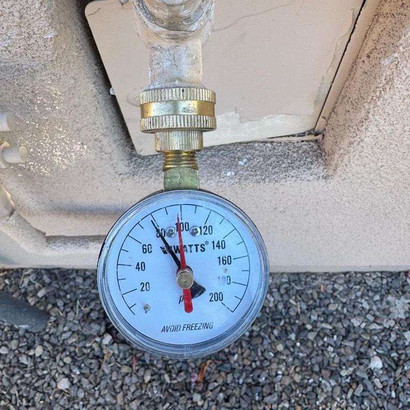 Pressure gauge on irrigation system valve in gravel bed