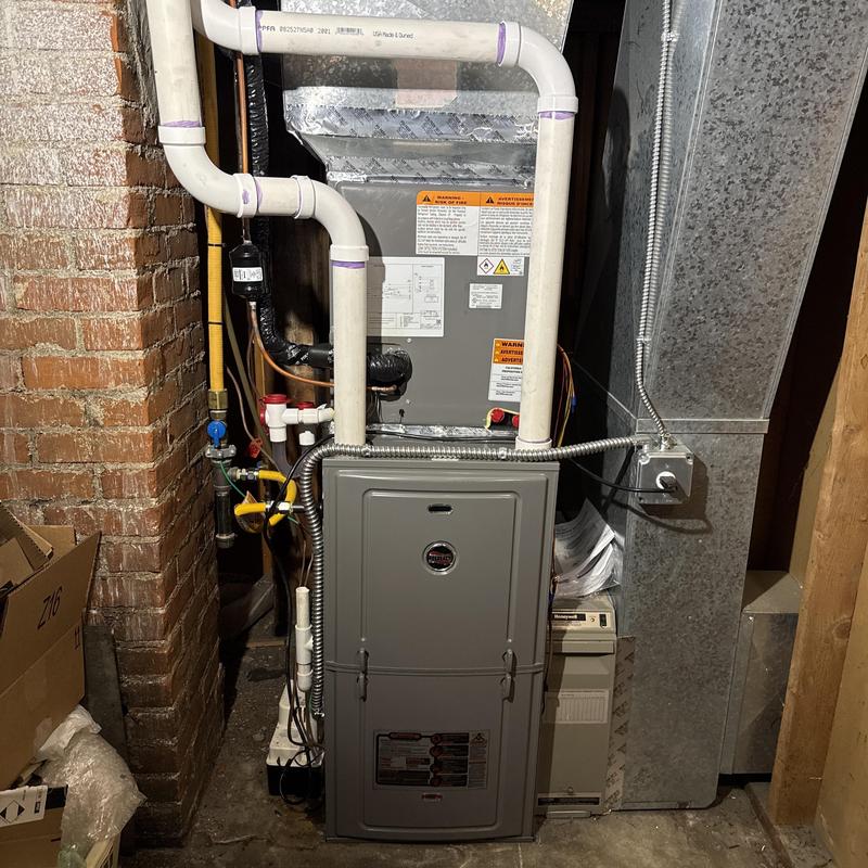 Ruud gas furnace with PVC vent pipes installed Ruud gas furnace with PVC vent pipes installed