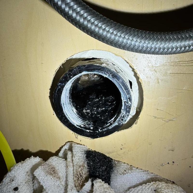 Sink drain pipe clogged with grease and debris inside Sink drain pipe clogged with grease and debris inside