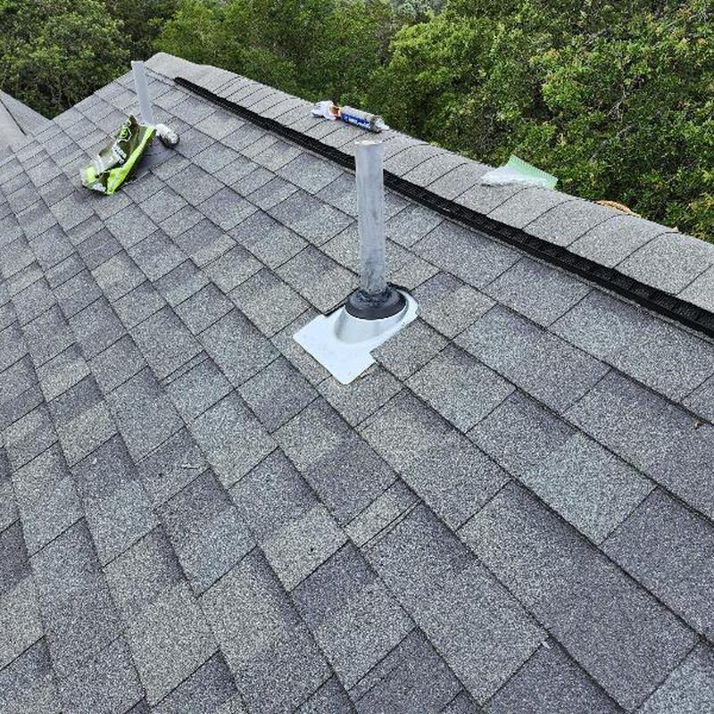 Plumbing boot on shingle roof with new flashing