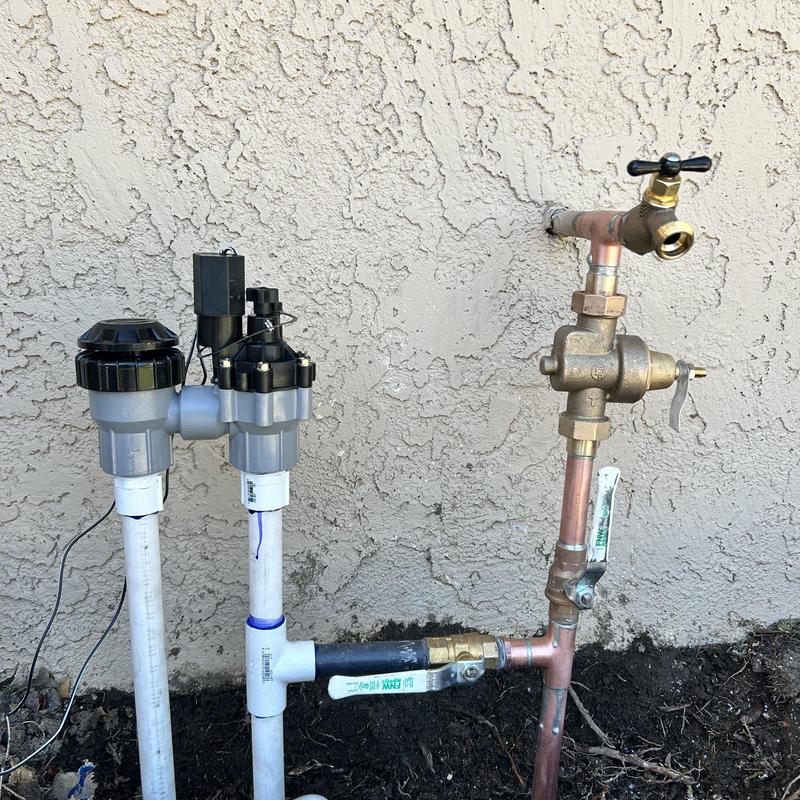 Pressure reducing valve and irrigation valve installation outdoors