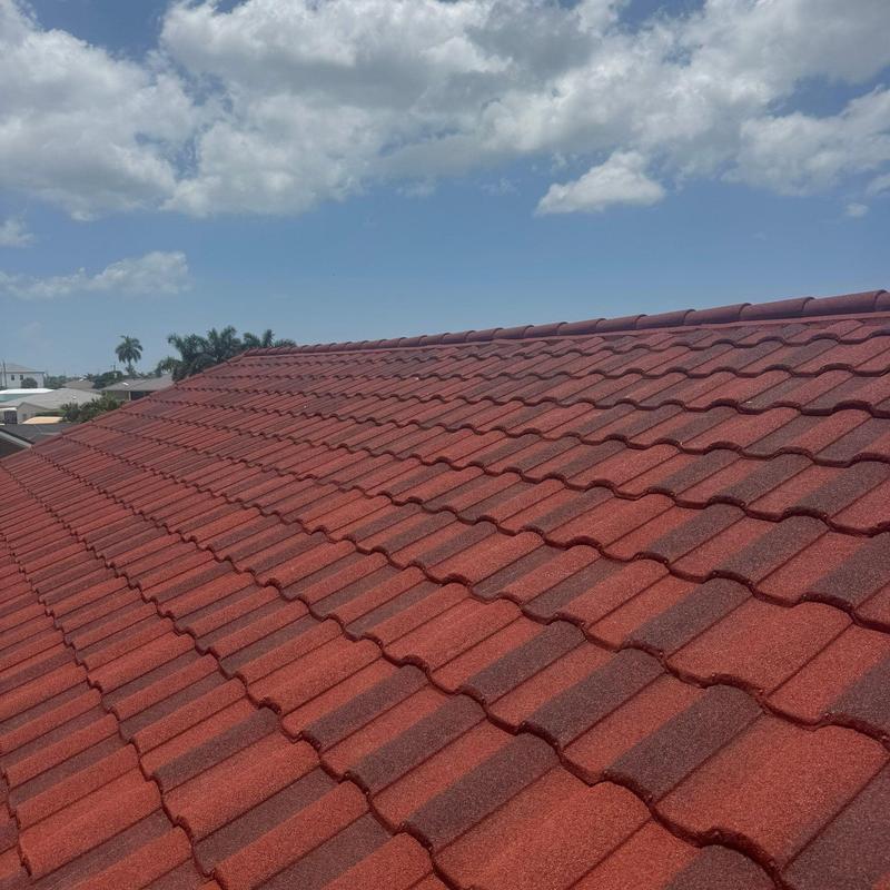 Stonecoated steel roof tiles on new garage addition