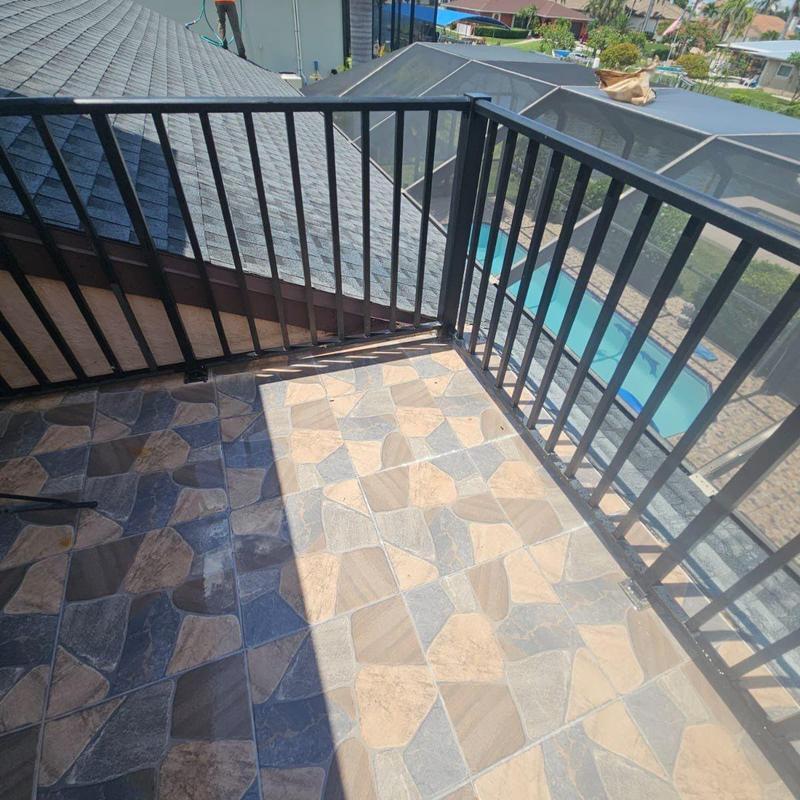 Shingle roof to flat deck transition inspection Cape Coral