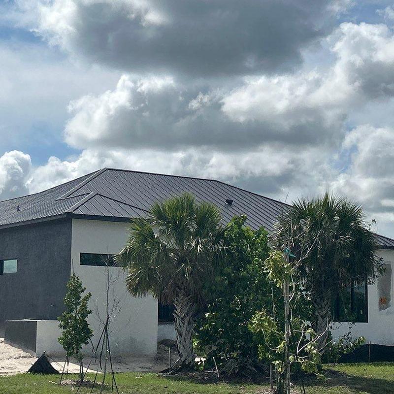 Standing seam metal roof on new construction house