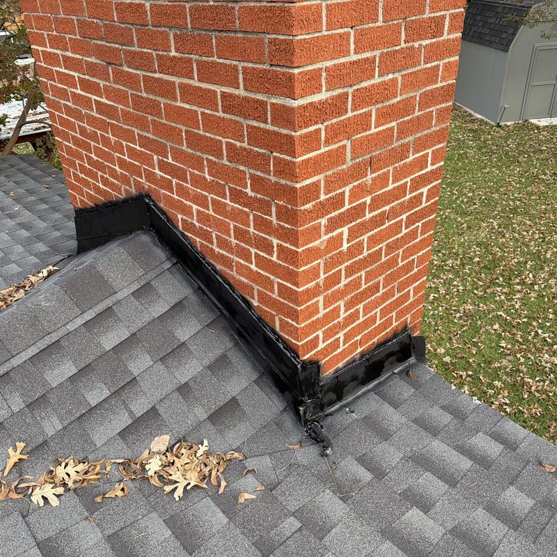 Brick chimney flashing on asphalt shingle roof, Fort Worth TX