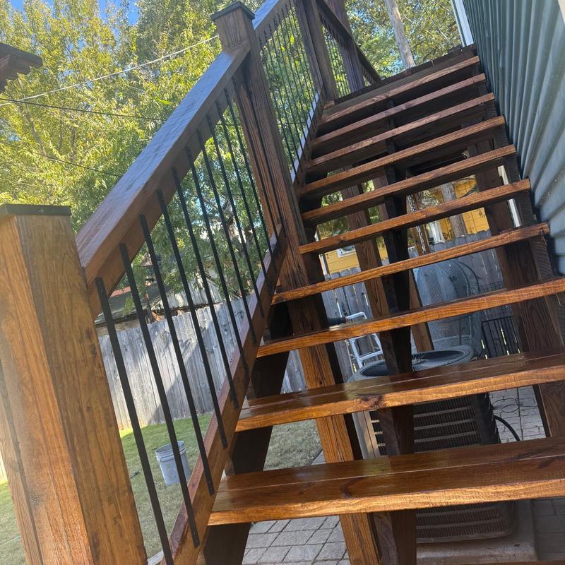 Garage apartment wooden stairs with metal balusters