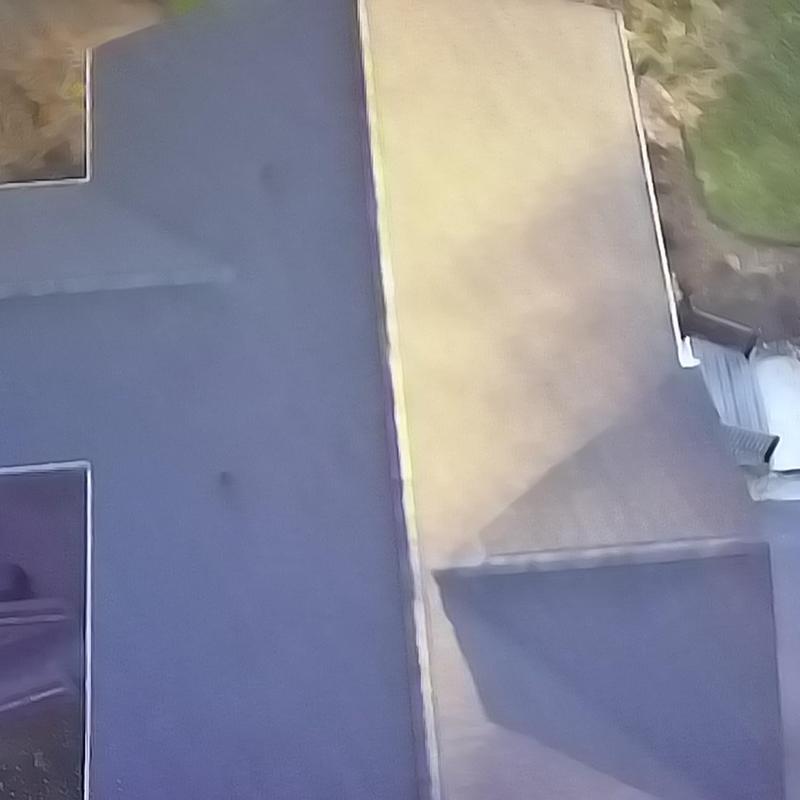 Atlas Shadow Black roof system installation overhead view