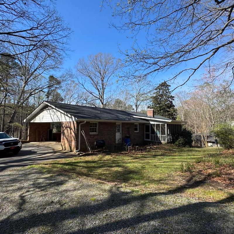Asphalt shingle roof inspection on brick house in Acworth