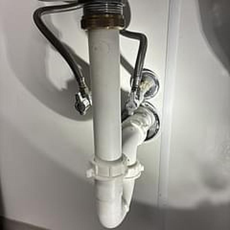 Kitchen sink drain pipe with water supply lines