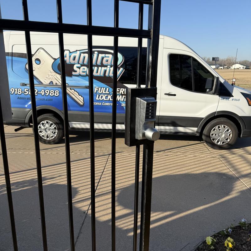 Simplex keypad lock on park gate with service van