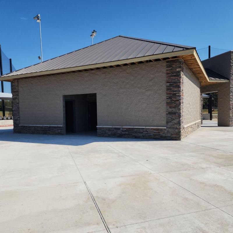 Standing seam metal roof on concession stand at park
