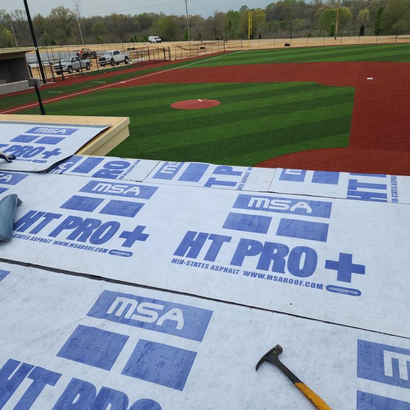 Standing seam metal roof underlayment at baseball park