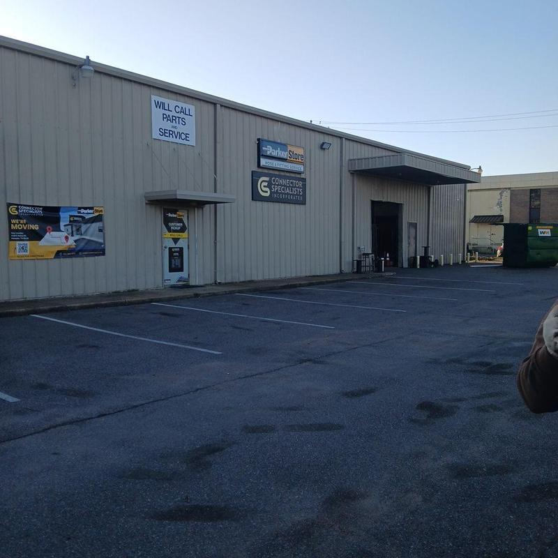Commercial metal roofing on industrial building exterior