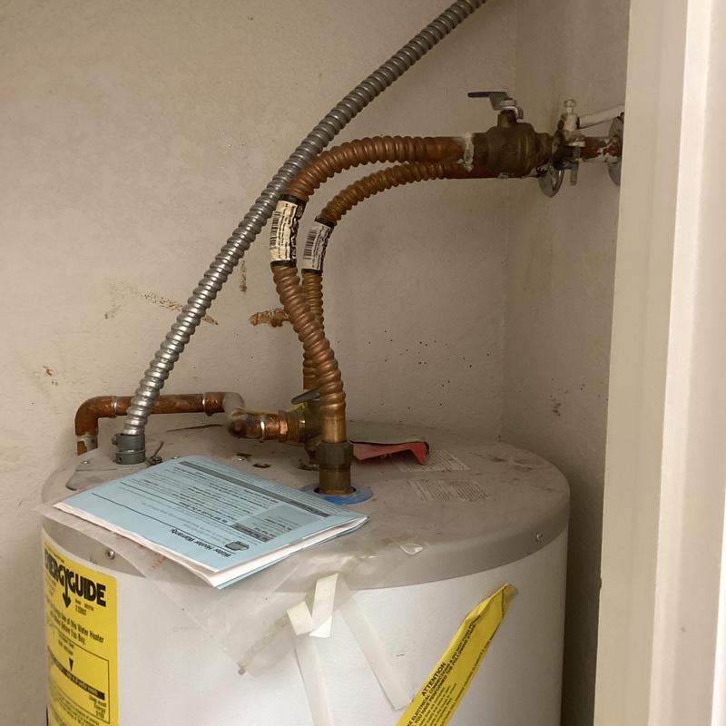 Water heater with copper inlet/outlet pipes and valve