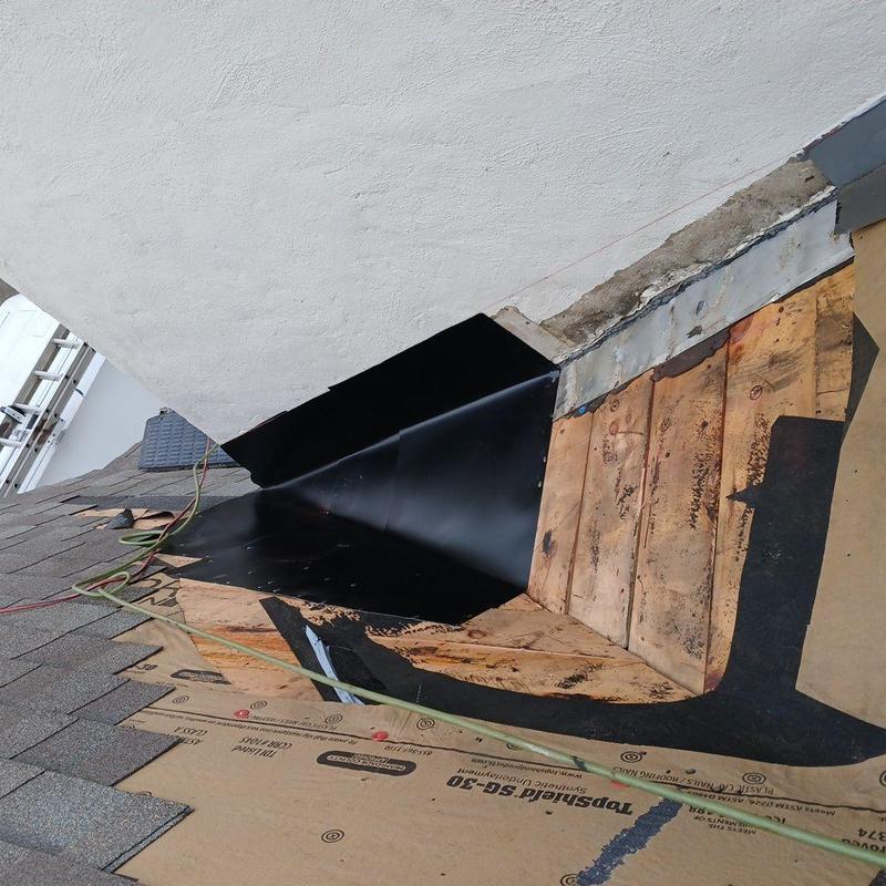 Dead valley metal pan flashing installation on roof