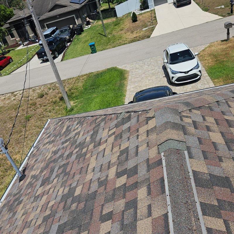 Shingle roof with repaired ridge cap in Cape Coral
