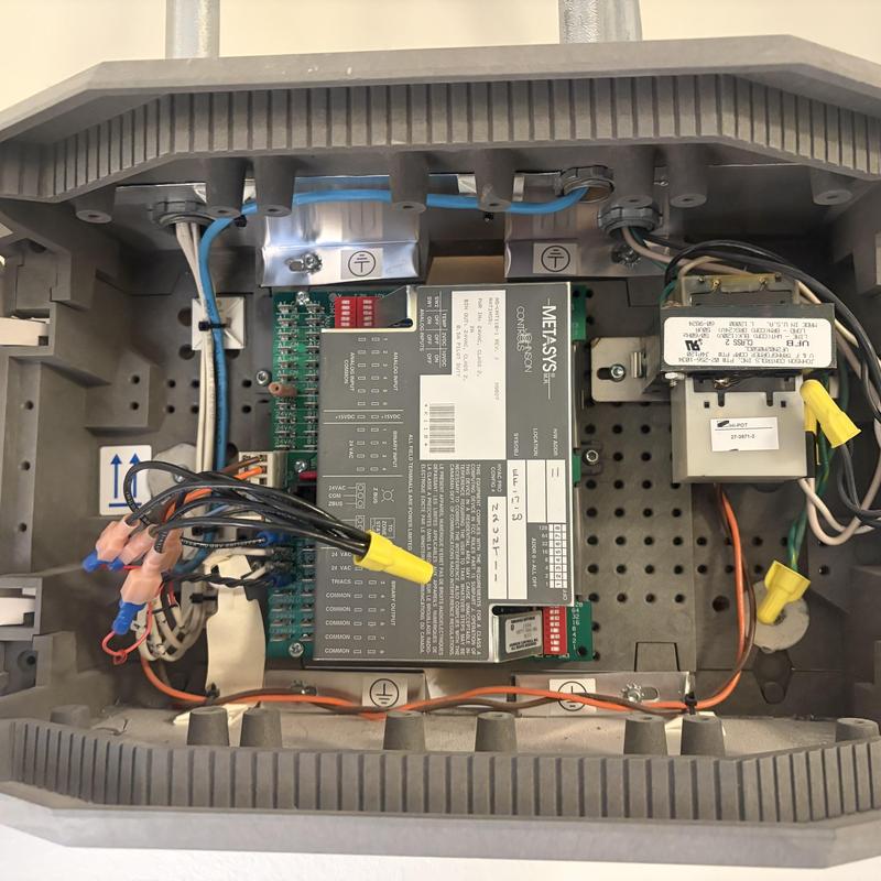 Metasys control system circuit board inside panel