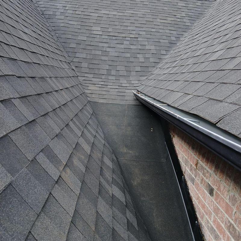 Roof valley with new shingles and custom flashing