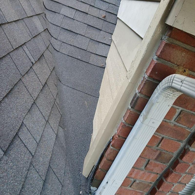 Custom dead valley pan with asphalt shingles and siding