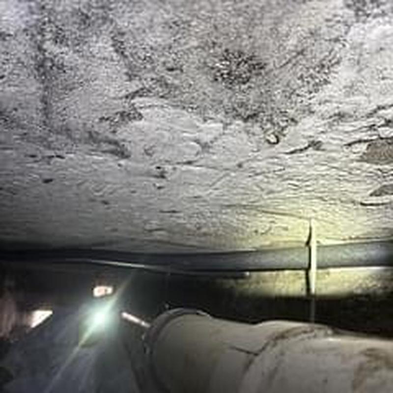 Sub-slab cast iron drainage pipe replacement in crawl space