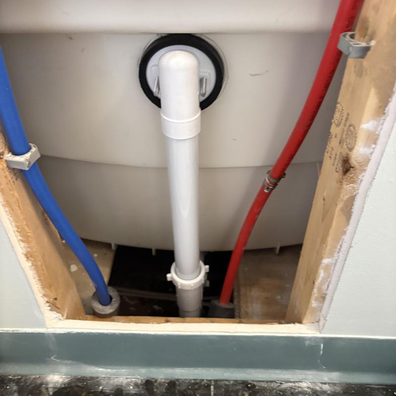 Bathtub drain pipe with new PVC installation