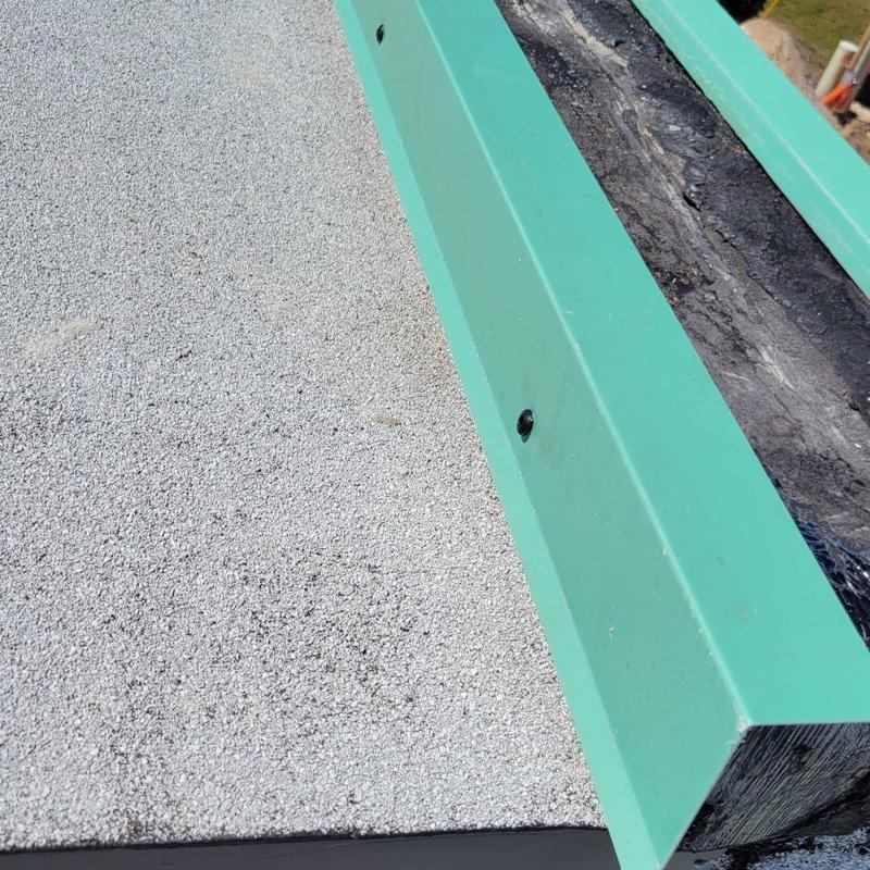 Metal edge detail on built-up flat roof system
