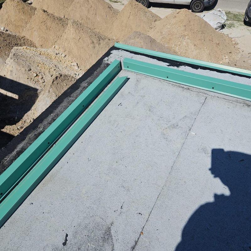 Metal edge flashing installation on flat roof system