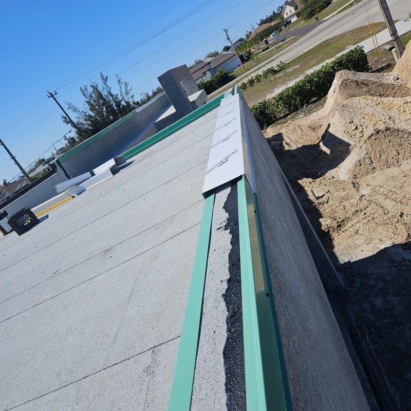 Metal edge on flat built-up roof installation in Cape Coral