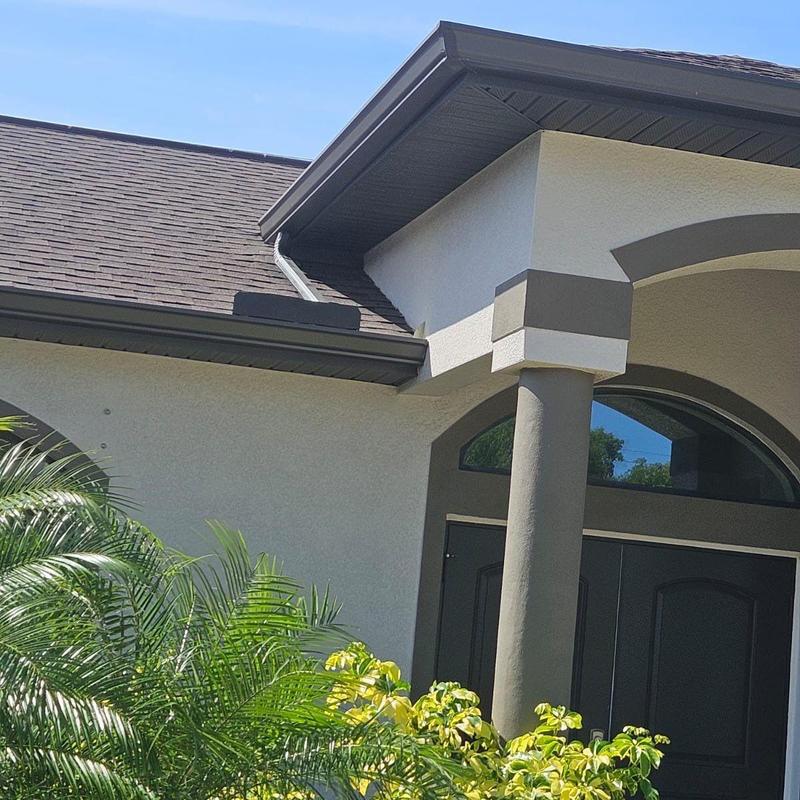 Shingle roof and wall flashing on Cape Coral home