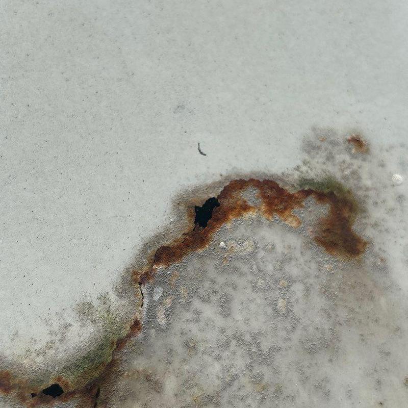 Standing seam metal roof rust and corrosion damage