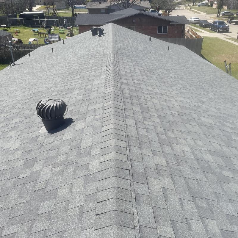 Asphalt shingle roof ridge with turbine vent in good condition Asphalt shingle roof ridge with turbine vent in good condition