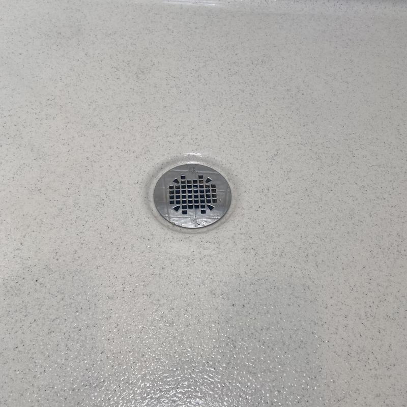 Shower drain on textured shower floor