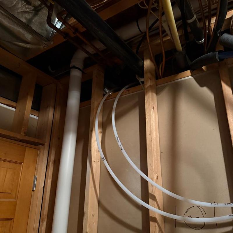 Kitchen plumbing rough-in with PEX piping and vent pipe