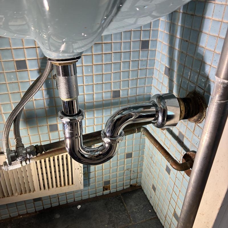 Basin P-trap replacement and drain cable clearing