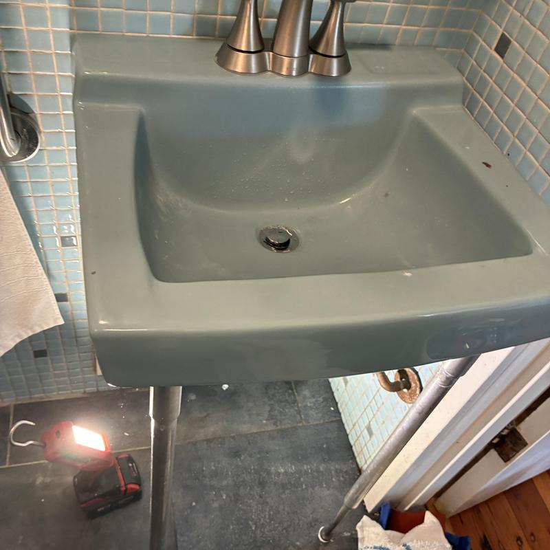 Basin drain and P-trap with faucet and pipe legs