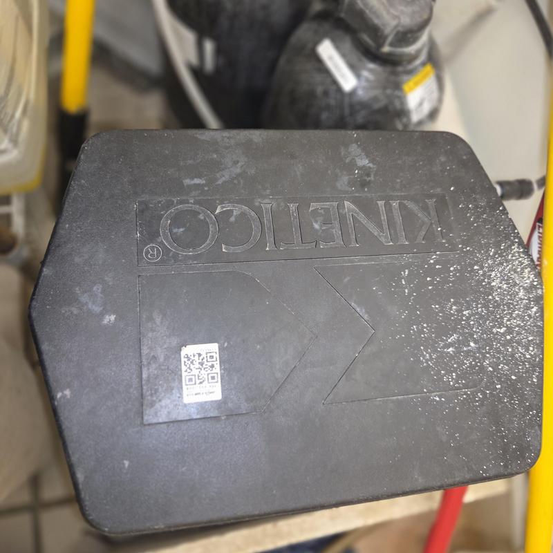 Water softener control valve at kitchen unit