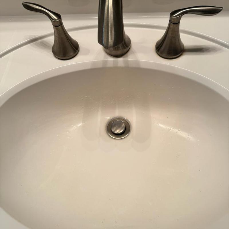 Bathroom sink pop-up drain and faucet assembly Bathroom sink pop-up drain and faucet assembly