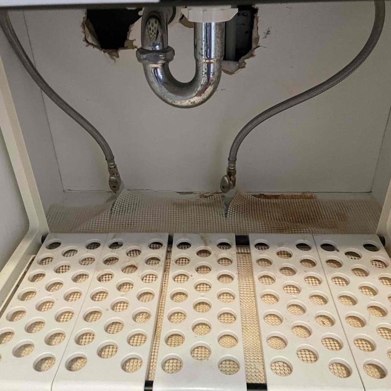 Under-sink water supply valves and P-trap plumbing setup