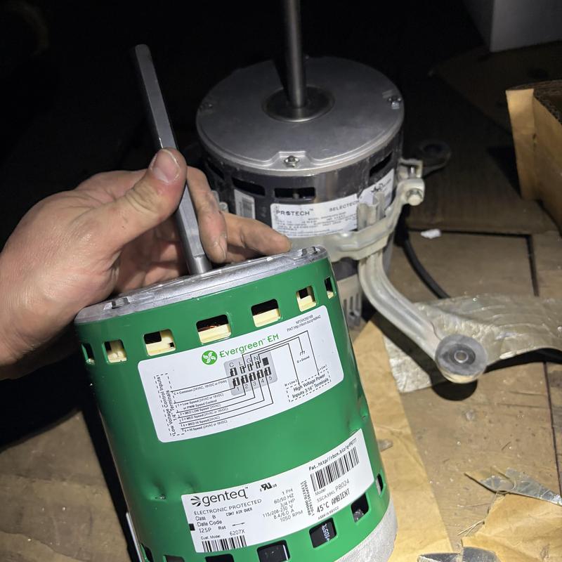 Blower motor HVAC installation with tools in hand