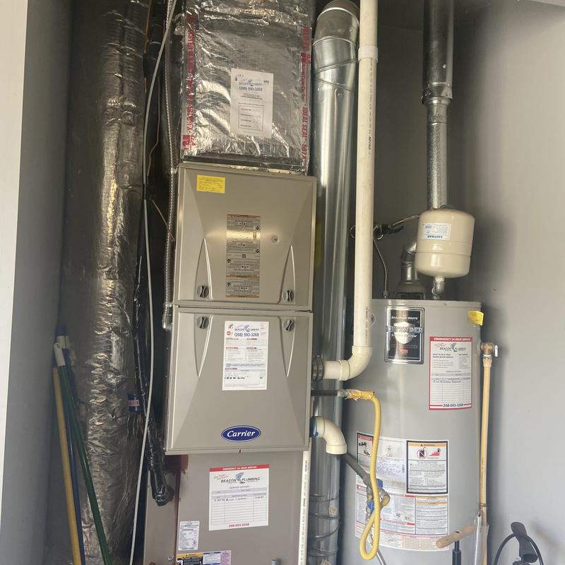 Carrier air handler and water heater with ductwork